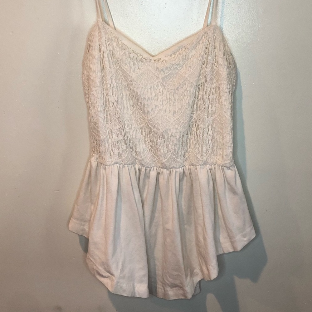 A white top with puffy bottom